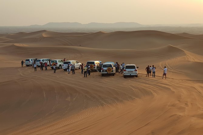 Dubai 4x4 Desert Safari, Quad Bike, Camel Ride & BBQ Dinner - From Dubai Hotels to Lahbab’s Red Dunes