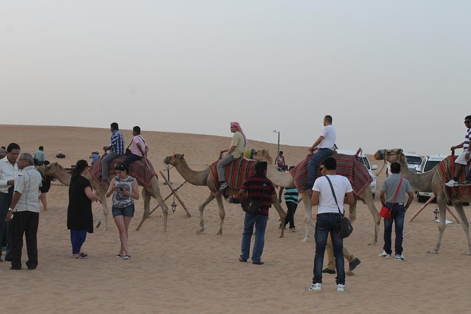 Dubai: Buggy Dune Bashing, Sand Boarding, Camel Ride & Show - What happens at the desert camp