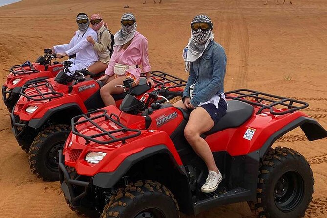 Dubai: Buggy Dune Bashing, Sand Boarding, Camel Ride & Show - Sandboarding on the tall dunes