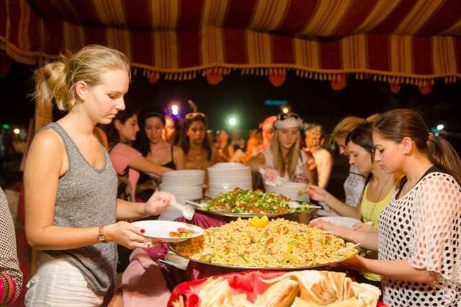 Dubai Desert Safari Adventure, 60mins ATV, Camel Ride, Shows, BBQ - Camel riding, sandboarding, and camp activities