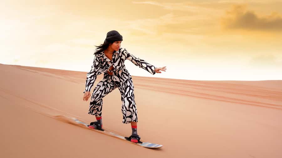 Dubai Desert Safari - Camel Ride, Sandboarding & 30 Min Quad - Sandboarding without a steep learning curve