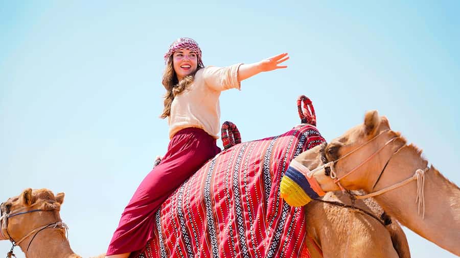 Dubai: Desert Safari, Camel Ride, Sandboarding, Quad Bike - The Red Dunes set the pace