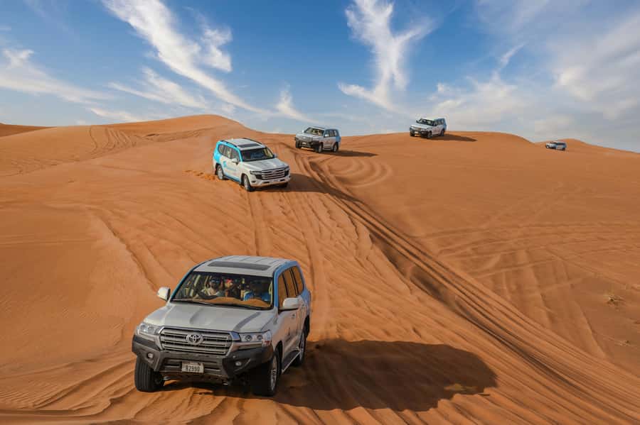 Dubai: Desert Safari, Quad Bike, Camel Ride & Al Khayma Camp - Quad biking at Lahbab: extra speed with extra responsibility