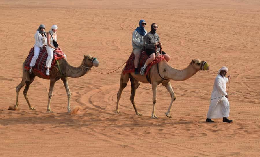 Dubai: Desert Safari, Quad Bike, Camel Ride and Sandboarding - Leaving Dubai for the red dunes of Lahbab