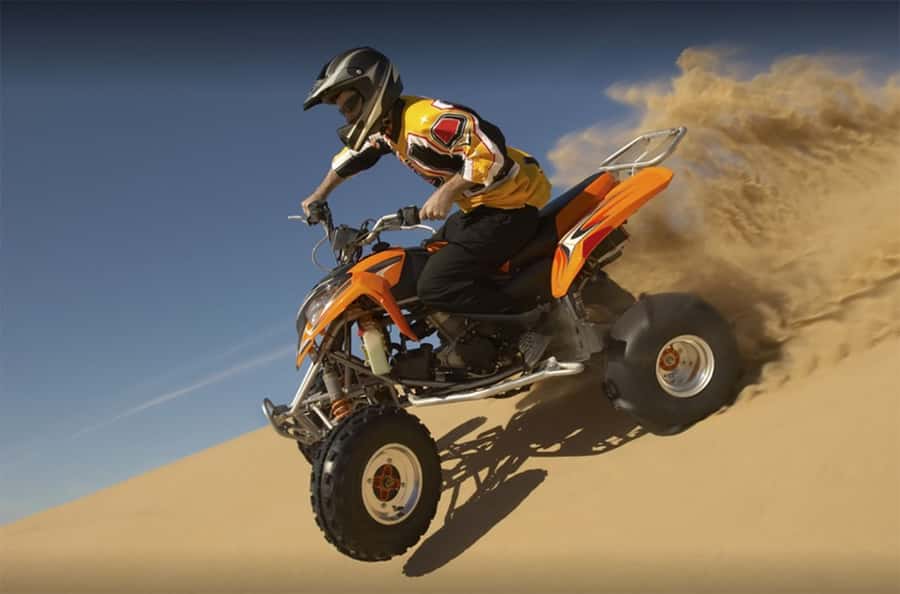 Dubai: Desert Safari, Quad Bike, Camel Ride and Sandboarding - Dune bashing is the heart of the experience