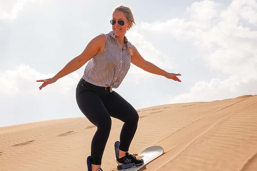 Dubai: Desert Safari, Quad Bike, Sandboarding, Camels & BBQ - Quad biking: the high-energy optional extra