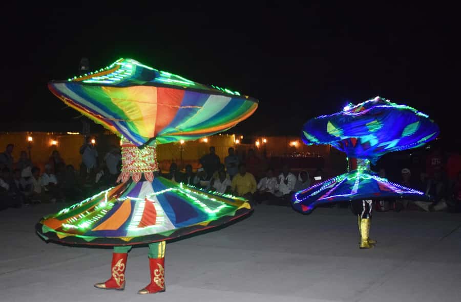 Dubai Desert Safari, Quad Biking, Camel Ride, & Sandboarding - Sandboarding and a five-minute camel ride
