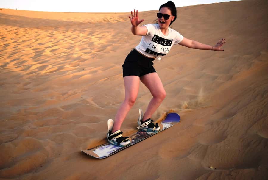 Dubai Desert Safari, Quad Biking, Camel Ride, & Sandboarding - Sunset, Arabic coffee, and the camp setting