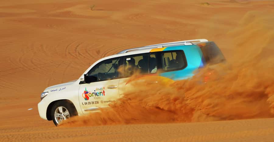 Dubai Desert Safari, Quad Biking, Camel Ride, & Sandboarding - The dune drive: thrilling, but not gentle