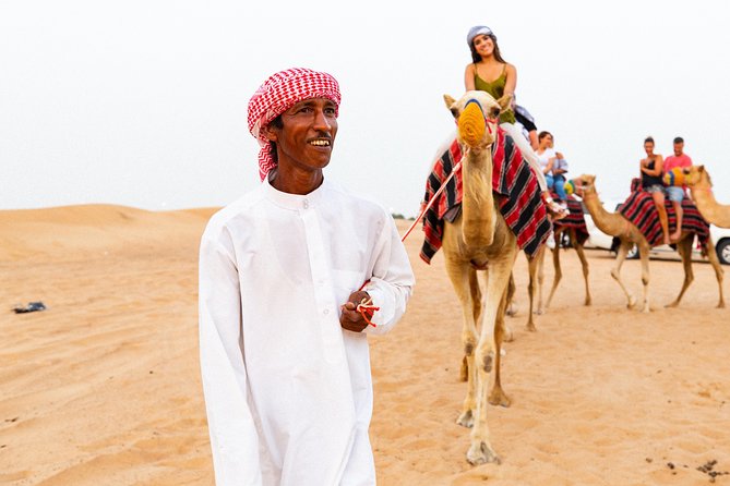 Dubai Desert Safari with Quads, BBQ Dinner, Camel ride, & Shows - From Dubai hotel to open desert