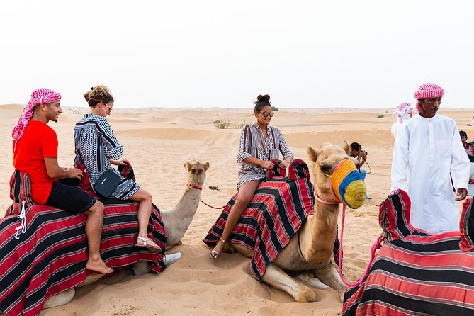 Dubai Desert Safari with Quads, BBQ Dinner, Camel ride, & Shows - Arabic coffee, dates, and the Bedouin-style camp