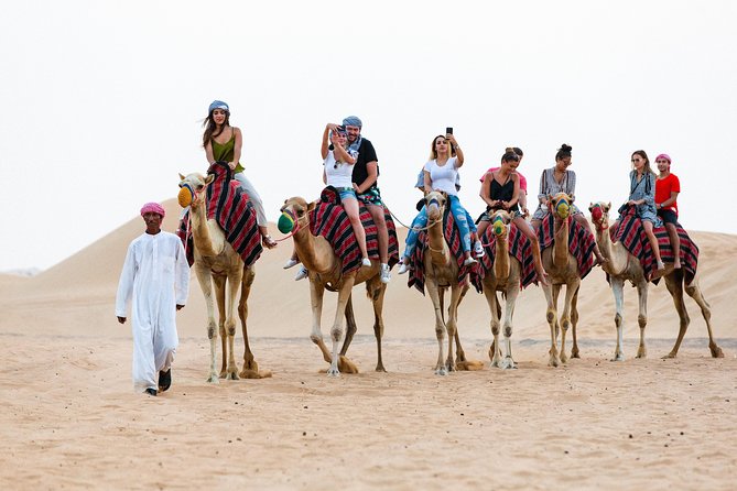 Dubai Desert Safari with Quads, BBQ Dinner, Camel ride, & Shows - Quad bikes for riders aged 13 and above