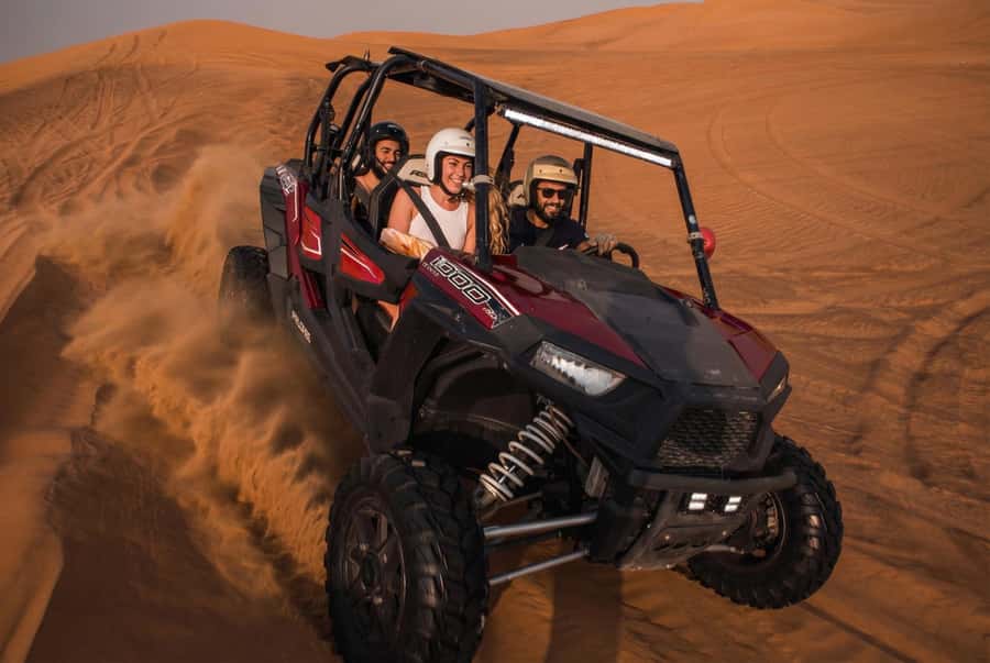 Dubai: Dune Buggy Desert Safari, Camel Ride & Sandboarding - Sandboarding on the red dunes