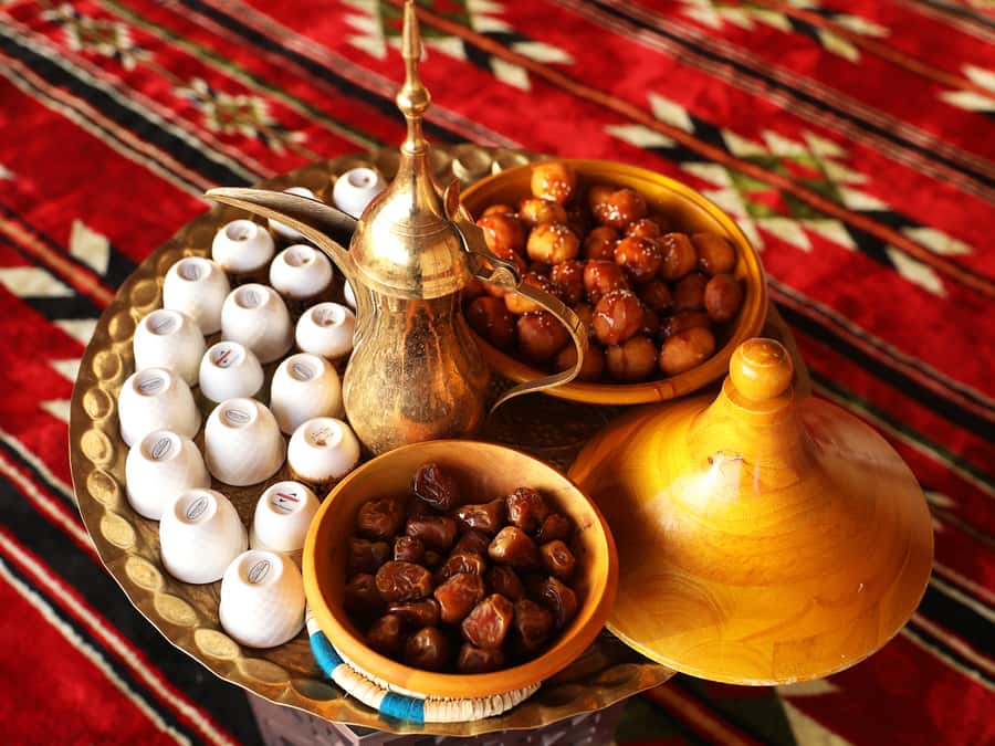 Dubai: Dune Buggy Desert Safari, Camel Ride & Sandboarding - Camel ride and feeding at Al Khayma camp
