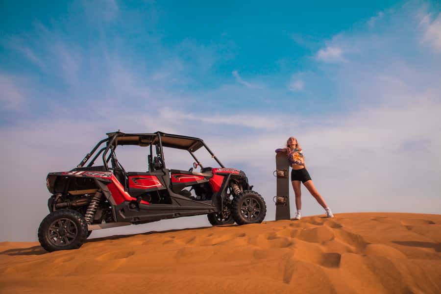 Dubai: Dune Buggy Desert Safari, Camel Ride & Sandboarding - BBQ dinner, drinks, and the evening program