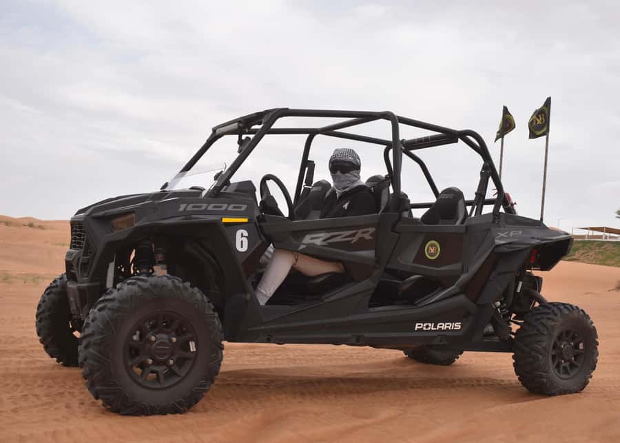 Dubai: Dune Buggy Safari and Camel Ride with Transportation - Sandboarding on the biggest dunes