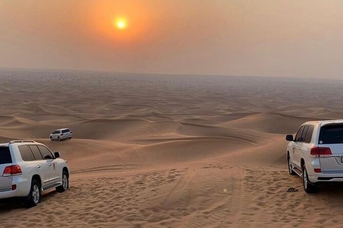 Dubai Dunes Safari With Quad Bike, Camel Ride, BBQ Dinner & Live Shows - Sunset in the desert