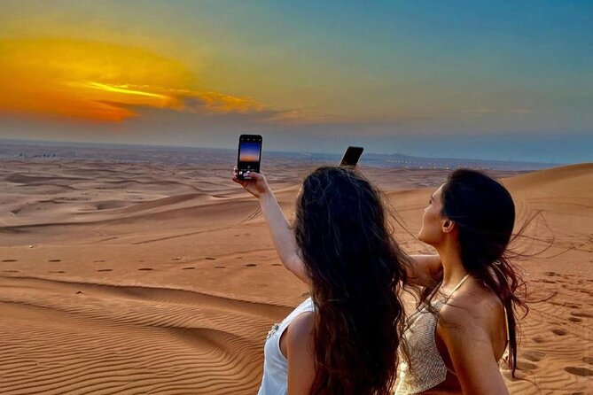 Dubai Evening Desert Safari With Transfers Dune Bashing & Dinner - Lahbab dunes, quad bikes, and optional upgrades