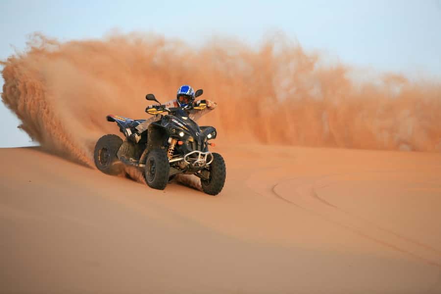 Dubai: Evening Tour with Quad Biking, Camel Ride, and BBQ - Dune bashing brings the loudest thrills