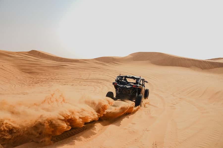 Dubai: Extreme Can-Am Buggy Desert Safari Adventure - Sandboarding gives the tour a second kind of fun