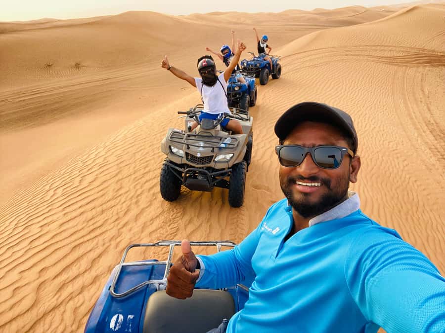 Dubai: Half-Day Desert Safari, Camel Ride, ATV & Dune Buggy - A short camel ride and falcon photo stop