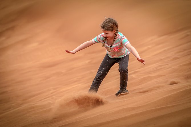 Dubai: Half-Day Desert Safari, Camels, Quad Bike & Refreshments - Dune bashing across the red sand