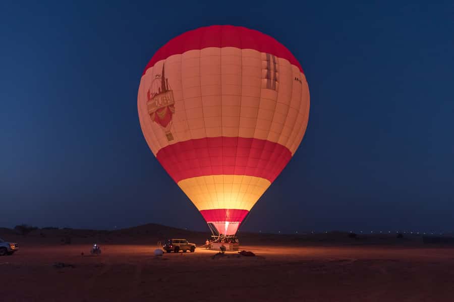 Dubai: Hot Air Balloon, Desert Safari, and Quad Biking Tour - Dune bashing across the red sands