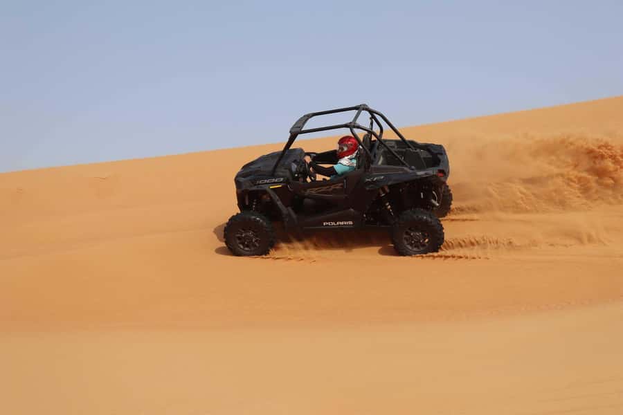 Dubai: Quad Bike, Dune Buggy, and Sandboarding Experience - Sandboarding on the red dunes