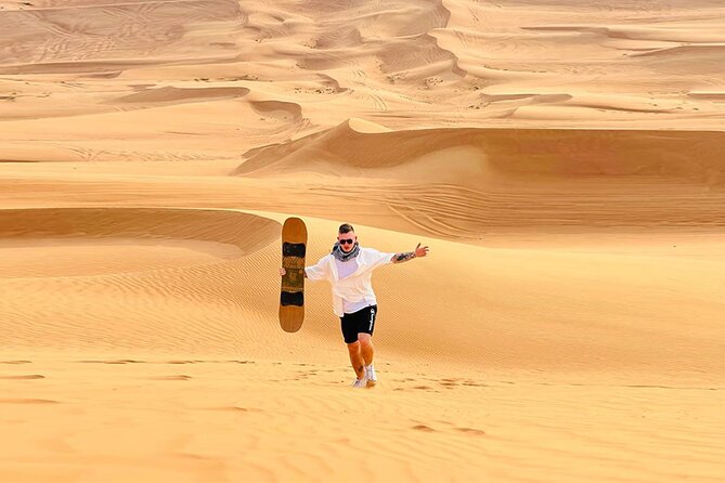 Dubai: Quad Bike Safari, Camels, & Camp with BBQ Dinner - From Dubai hotels to Lahbab’s red dunes