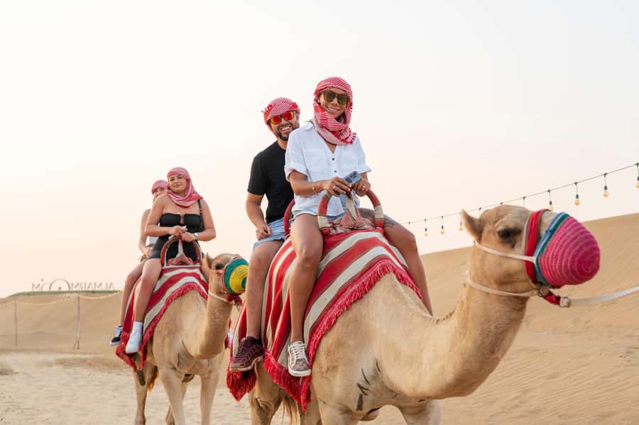 Dubai: Red Dune Desert Safari, Quad Bike, Camels, and BBQ - Hotel pickup and the first desert stop