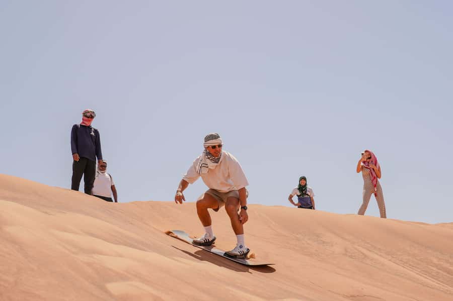 Dubai: Red Dune Desert Safari, Quad Bike, Camels, and BBQ - BBQ dinner and live entertainment