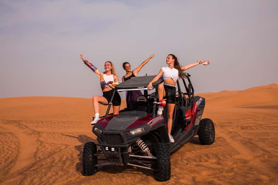 Dubai: Red Dune Desert Safari, Quad Bike, Camels, and BBQ - Dune bashing across the red sand
