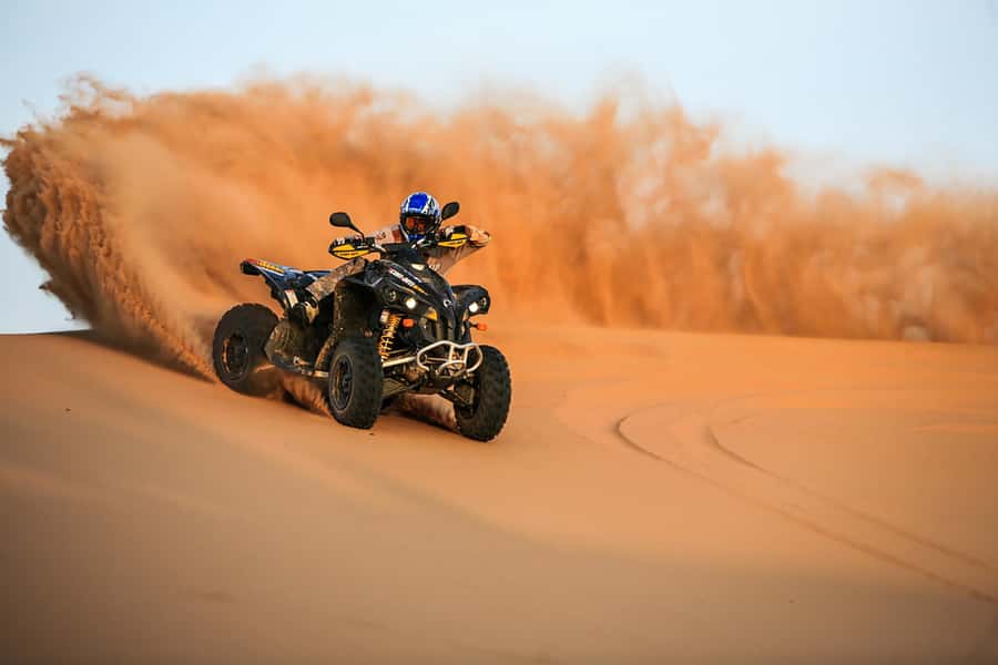 Dubai: Red Dune Safari, Quad Bike, Camel Ride, BBQ Dinner - From Dubai hotels to Lahbab’s red sand