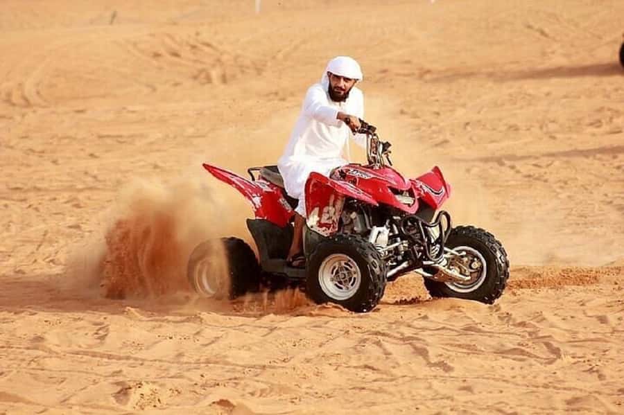 Dubai: Red Dunes Evening Quad Bike, Dune Blast with BBQ - The three-hour evening camp