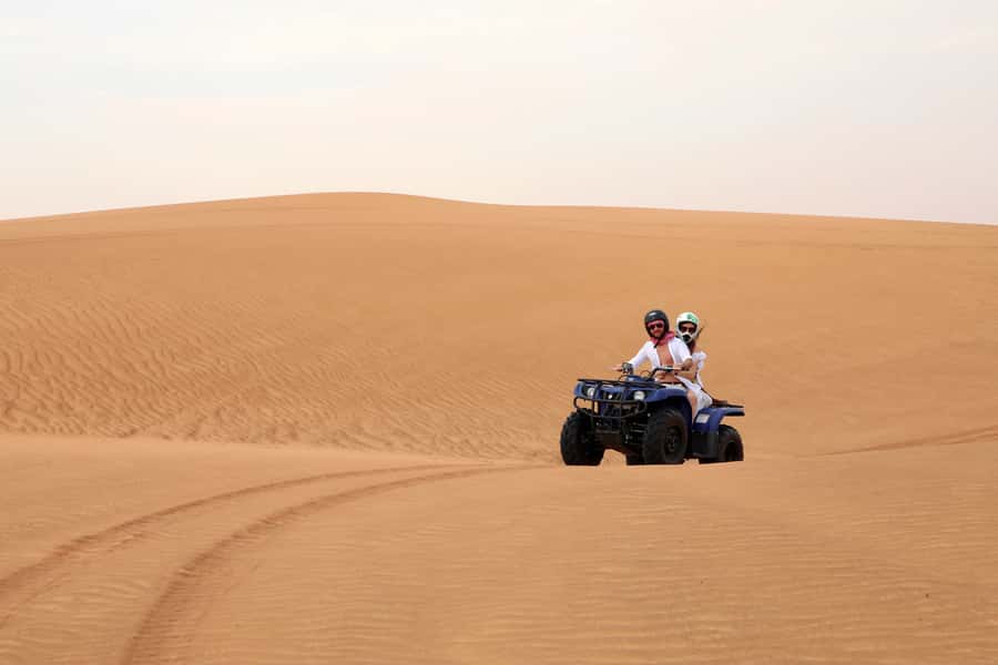 Dubai: Red Dunes Quad Bike with Sandboarding, Camels and BBQ - Who should book this desert safari?