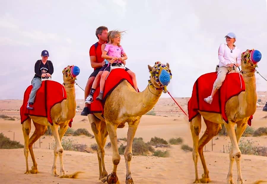 Dubai: Safari, Quad Bike, Camel Ride, and Buffet Dinner - Leaving Dubai for the Lahbab red dunes