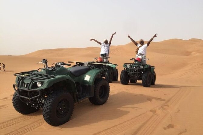 Dubai Self-drive Quad Bike, Sand Boarding, Camels & Refreshments - A short camel ride and the Bedouin-style camp
