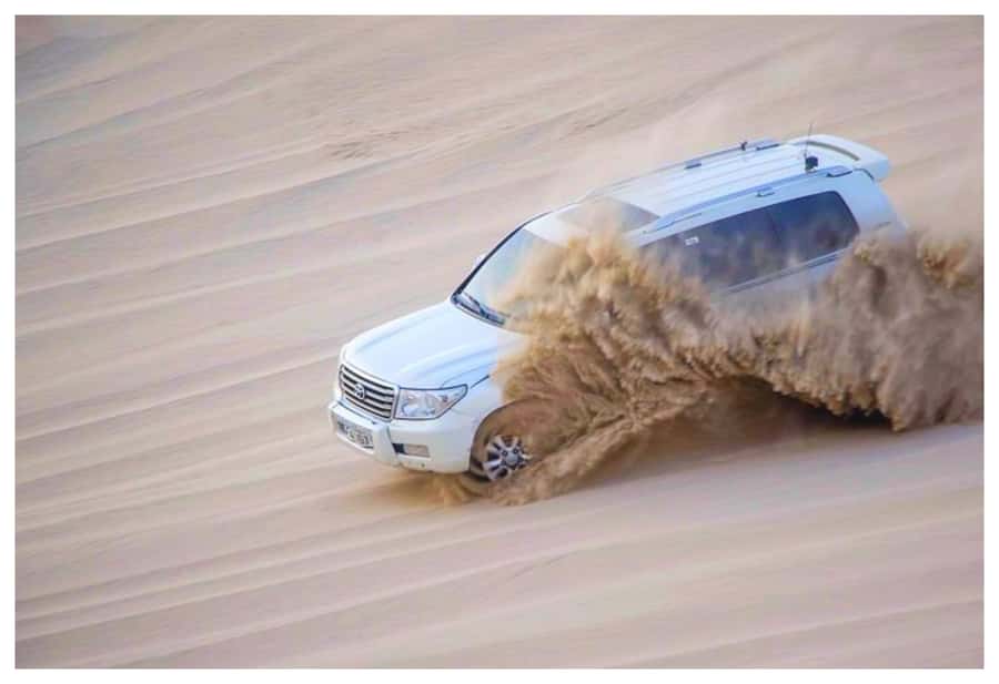 Dune Bashing, Sandboarding, Camel Ride & Optional ATV Ride - The camel camp at Mesaieed
