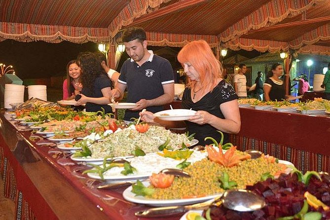 Evening Desert Adventure: Quad Biking, Sandboarding & Camel Ride - Tanoura, belly dancing, and the fire performance