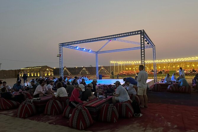 Evening Desert Safari with 30 Minutes ATV/Quad Bike Tours - Camel riding and sandboarding at the desert camp