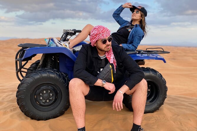 Evening Quad Bike, Desert Safari in Dubai , BBQ Dinner and Shows - Sandboarding, camel riding, and desert photographs