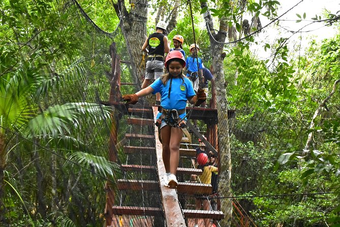 Extreme Horses Adventure with ATV, Ziplines & Cenote - ATV riding on a dusty jungle route