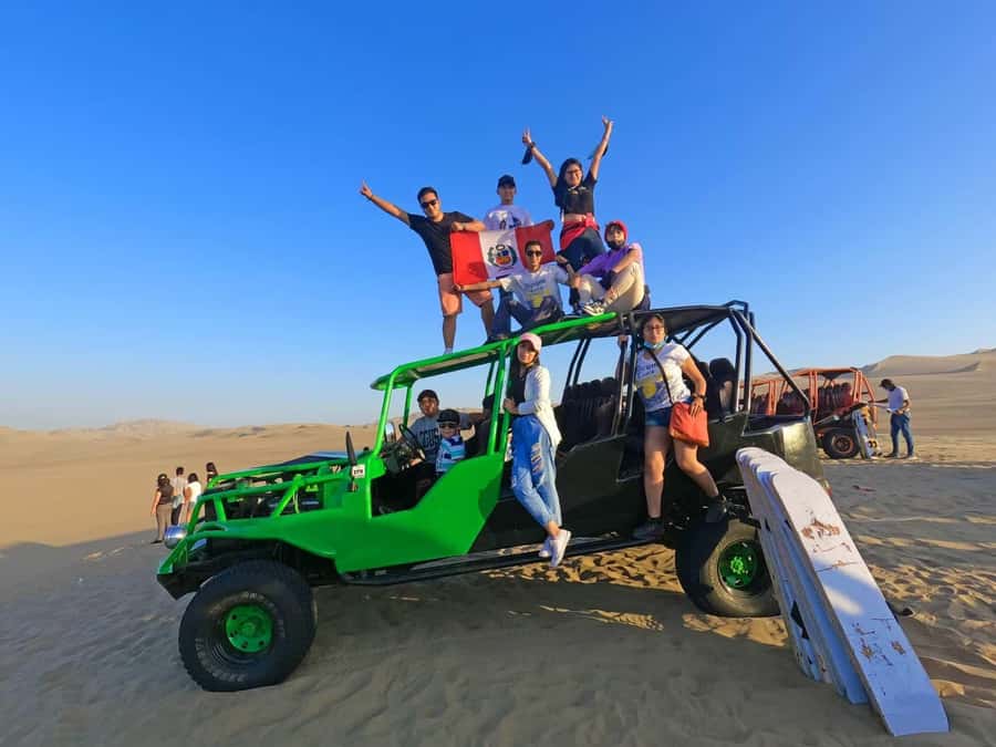 From Huacachina: Sandboarding and Dune Buggy Tour + Income - Learning to sandboard on the first dunes