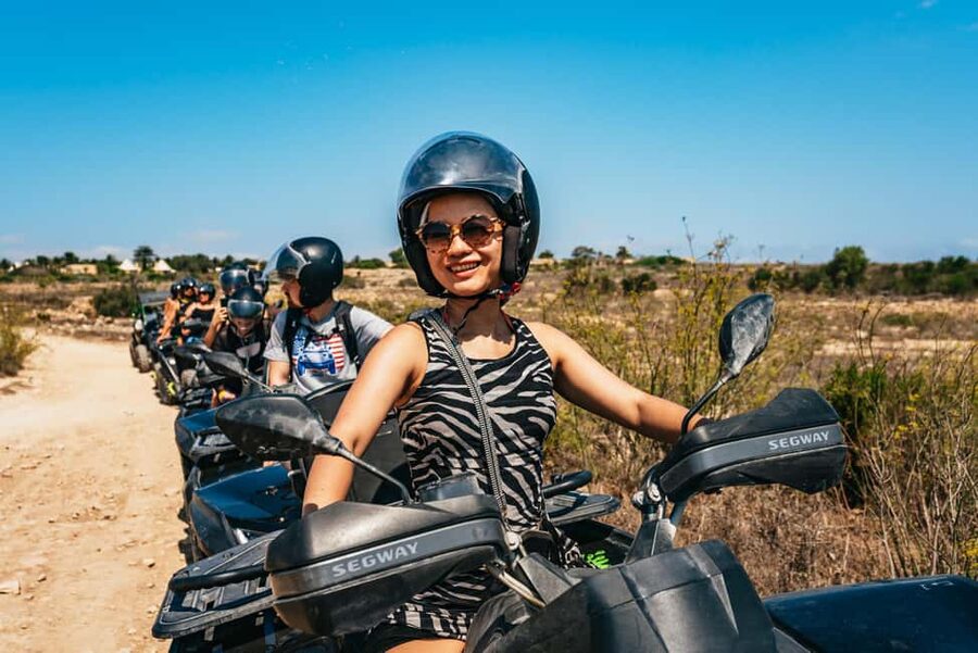 From Malta: Gozo Quad Bike Tour & Comino Boat Tour w/ Lunch - Returning to the water around Comino