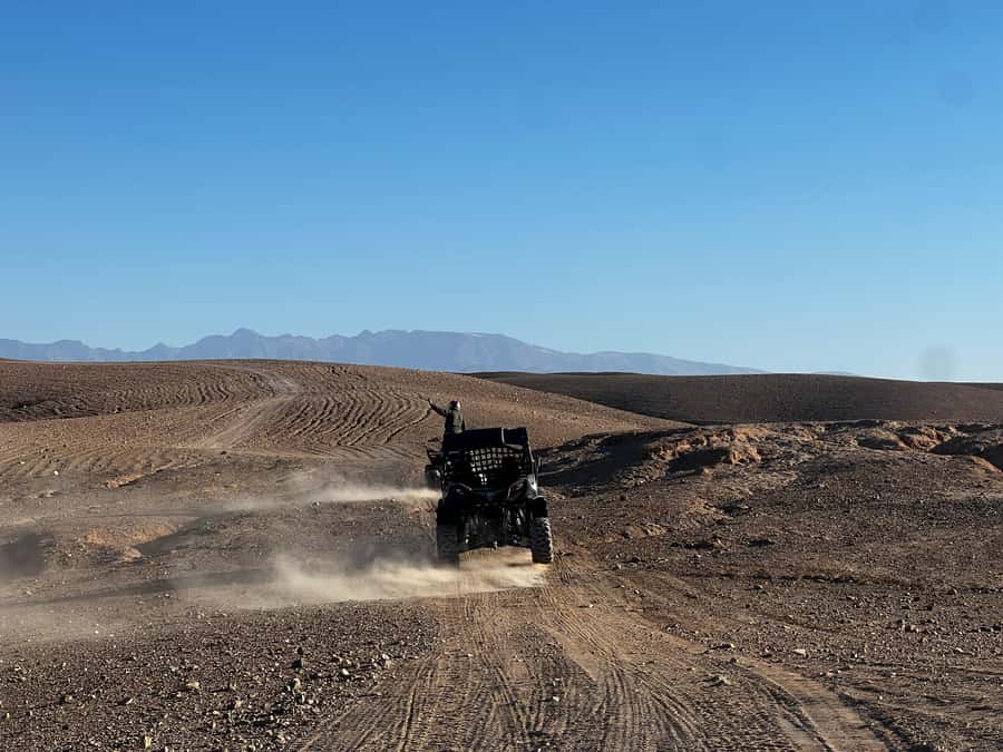 From Marrakech: Agafay Desert Buggy 1Hour & Dinner Show - Traditional dancing and the fire show