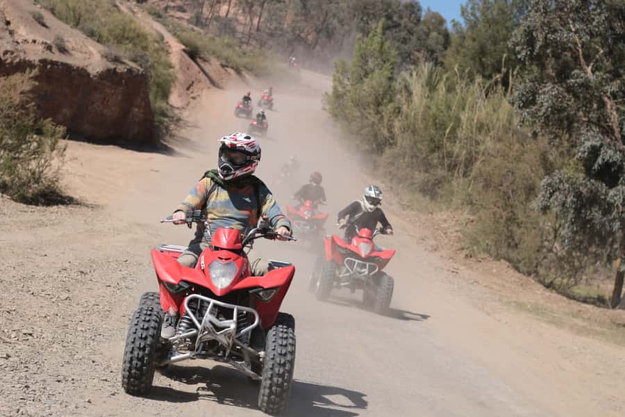 From Marrakech: Guided Quad Biking Tour in Agafay Desert - The best pause: tea above Lalla Takerkoust