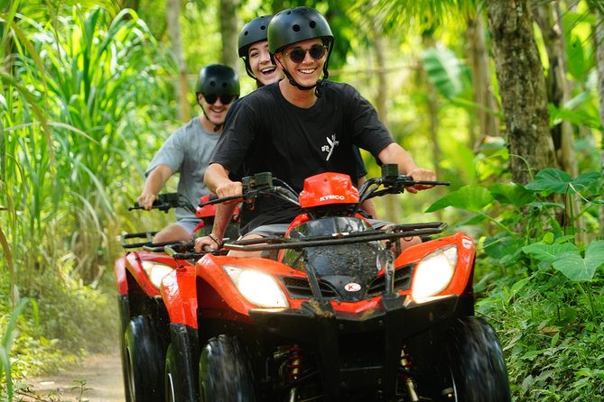 Full-Day Bali Adventure Tour with Quad Bikes and Rafting - Quad biking through rice fields and village tracks