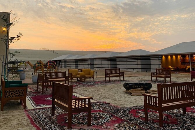 Full-day Qatar desert safari: dune bashing, sandboarding, camels - Camel riding, swimming, and sandboarding