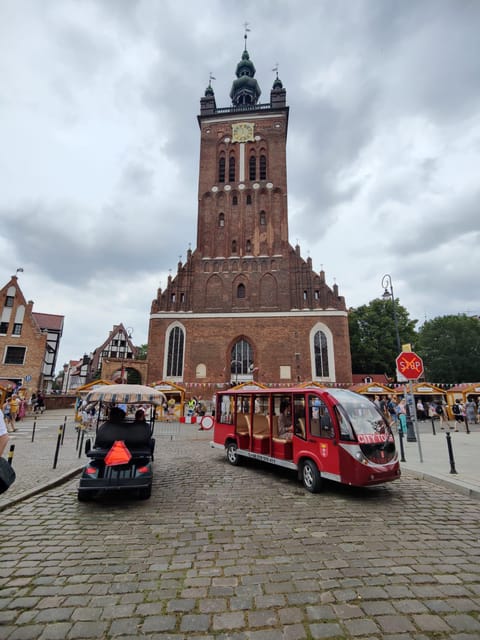 Gdansk: City Sightseeing Tour Eco Electric Buggy Golf Cart - Guide Style, Audio, and Group Expectations