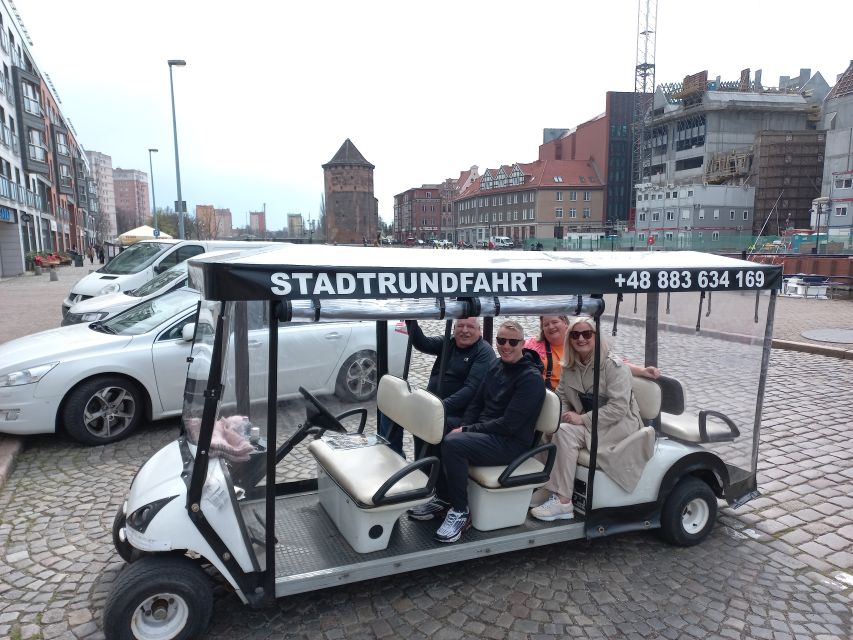 Gdansk: City Tour Live Guided by Golf Cart/Buggy Sightseeing - The Motława river, the Crane, and the port